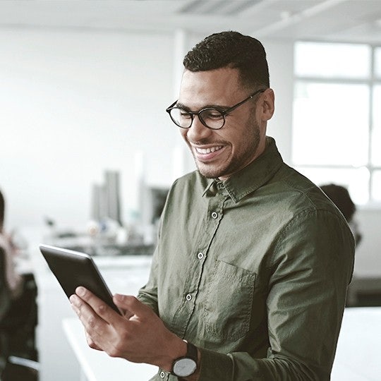 man looking into his phone