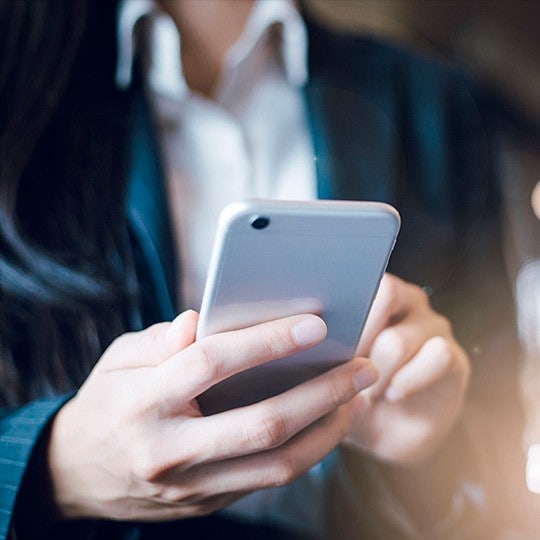 hands holding a smartphone