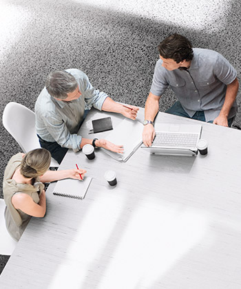 view from above of colleagues in a meeting
