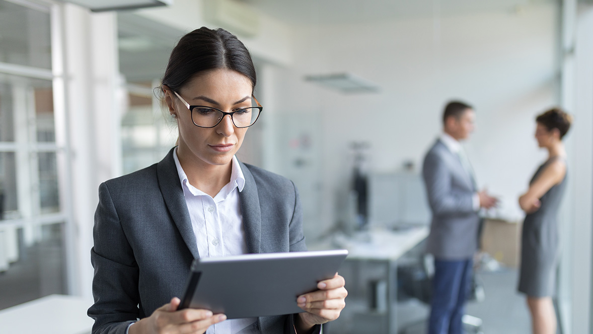 businesswoman looking at tablet