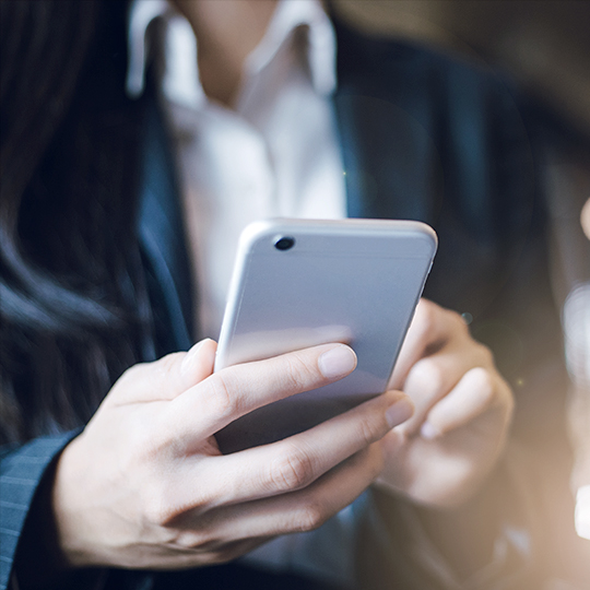 hands holding a smartphone