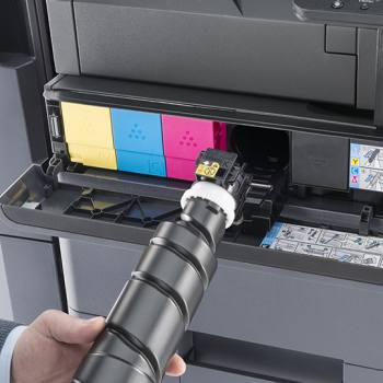 Long-lasting consumables toner being inserted into a Kyocera printer