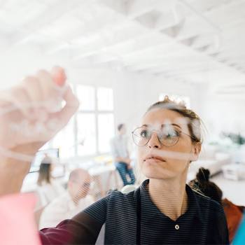 Innovation at the heart of our philosophy woman drawing