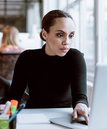 Case Study: Fleet optimisation by Kyocera woman with a laptop