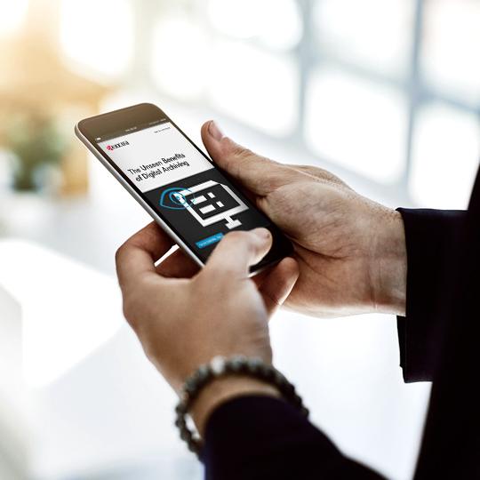 Get your copy of the whitepaper now man watching smartphone